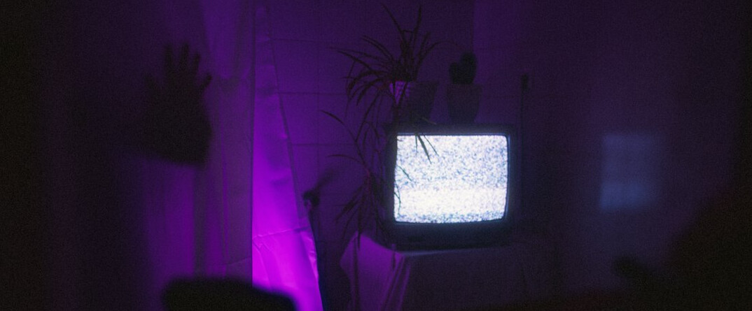 person watching old tv